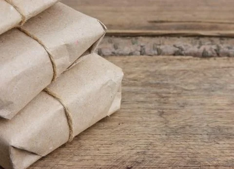 Pile parcel wrapped Stock Photos