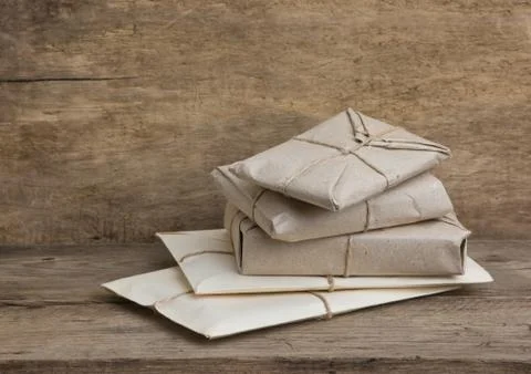 Pile parcel wrapped Stock Photos