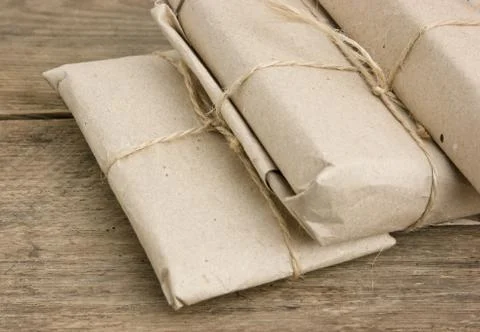 Pile parcel wrapped Stock Photos