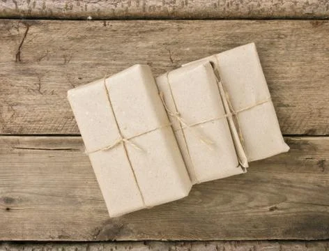 Pile parcel wrapped Stock Photos