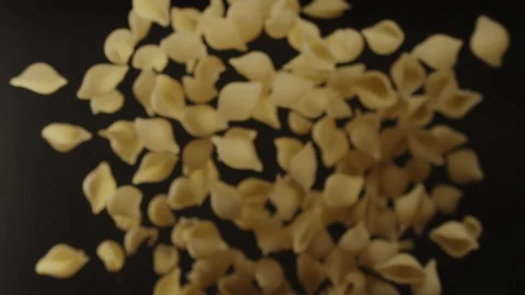 Pile of pasta flying isolated on black background, slow motion Stock Footage 116259483
