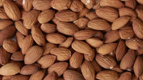 Pile of peeled raw almonds as a background. Rotation Stock Footage 159604881