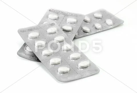 Pile of pills in blister packs Stock Photos