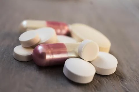 Pile of pills different size Stock Photos