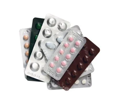 Pile of pills package Stock Photos