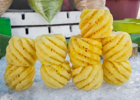 Pile of pineapples slices stack on ice Foto stock