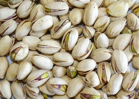 Pile of pistachios in shell Photos