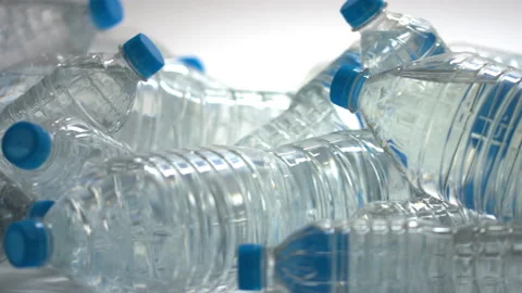 Pile of plastic bottles with water, close-up dolly shot Stock Footage 142903559