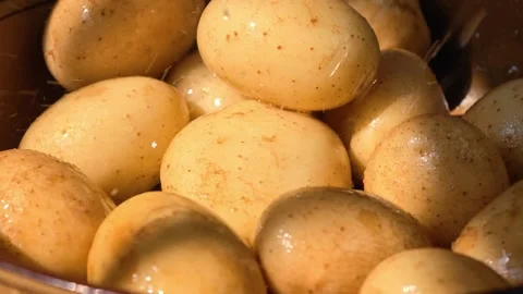 A pile of potatoes being washed by running water Stock Footage 344833053