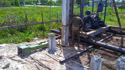 Pile Pressing Machine on the Construction Site Stock Photos
