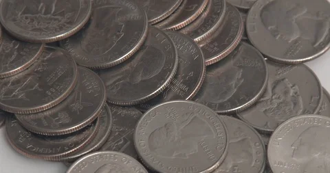 Pile of Quarters on White Background Rotating Stock Footage 91279947