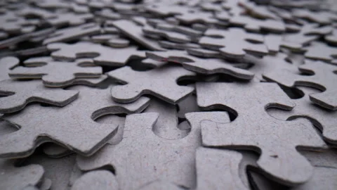 Pile of randomly lying puzzle or jigsaw pieces 스톡 동영상 199494766