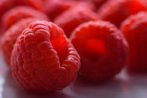 Pile of raspberry close up, selective focus Stock Photos