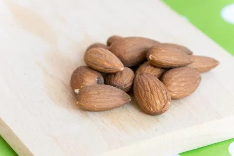 Pile of raw almonds Stock Photos