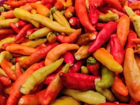 Pile of raw cayenne pepper Stock Photos