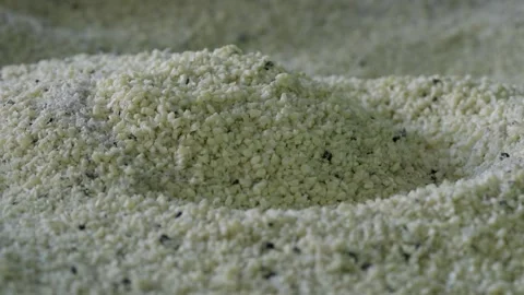Pile of recycled plastic granules and pellets in recycling factory Stock Footage 334167457