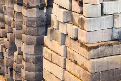 Pile of red bricks is construction materials. Stock Photos