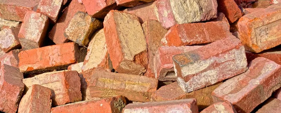 Pile of red bricks Stock Photos