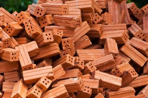Pile of red bricks Stock Photos