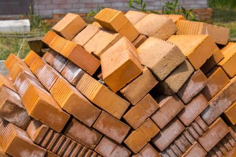 Pile of red bricks Stock Photos