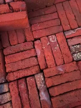 Pile of red bricks Stock Photos
