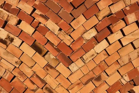 A pile of red building bricks Stock Photos
