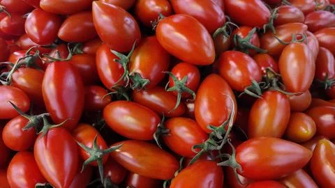 Pile of red cherry tomatoes Stockfoto's