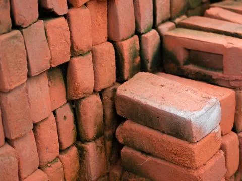 PILE OF RED CLAY BRICKS Stock Photos