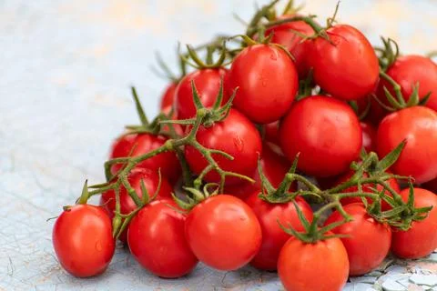 The pile of ripe tomatoes on the table Stock Photos