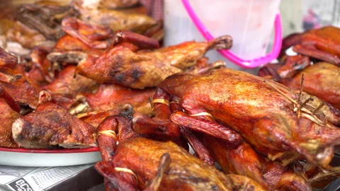 Pile of roasted and steamed five spices herb ducks sell in Asian market Stock Footage 170633874