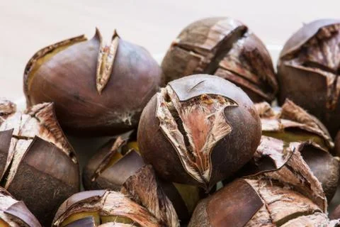 Pile of roasted chestnuts Stock Photos