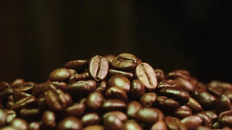 Pile of roasted coffee beans stock video footage close up Stock Footage 345159337