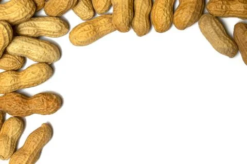 Pile of roasted peanuts on a white background Stock Photos