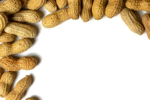 Pile of roasted peanuts on a white background Stock Photos