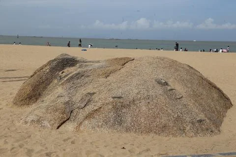 A pile of rocks on a beach Stock Photos
