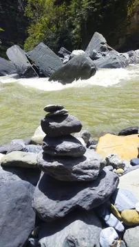Pile of rocks by the river 库存照片