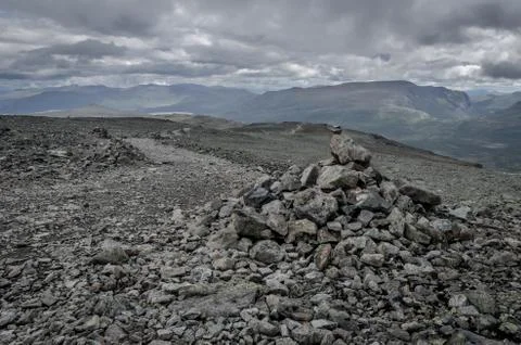 Pile of rocks on the walking path Stock Photos