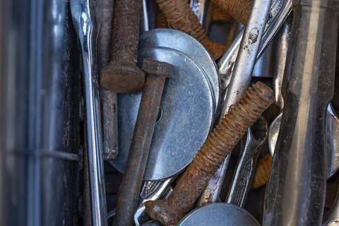 A pile of rusty tools and nails 스톡 사진