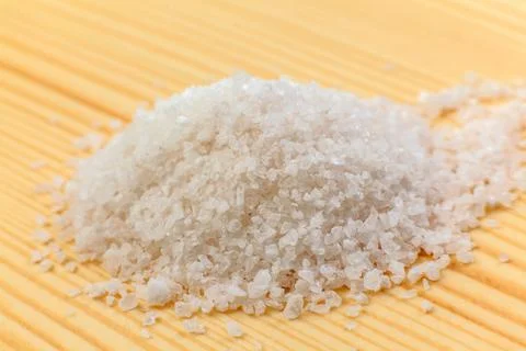 Pile of salt on the table Stock Photos