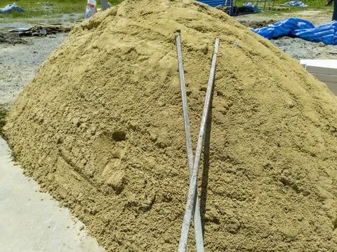 Pile of sand material for construction work Foto stock