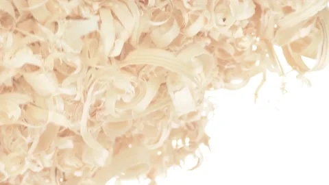 A pile of sawdust rotates in the left corner on a white background Stock Footage 172284961