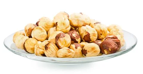 A pile of shell-less hazelnuts, isolated on white background Stock Photos