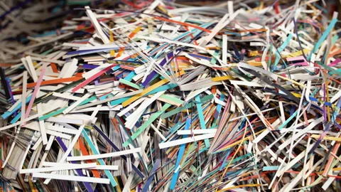 Pile of shredded paper. Document shredding, identity theft and fraud concept Stock Footage 257038812