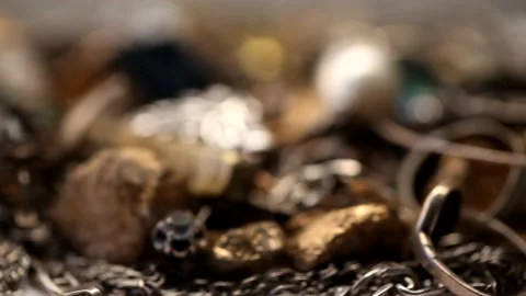 Pile of silver and gold jewelry with jewels rotating 4K Stock Footage