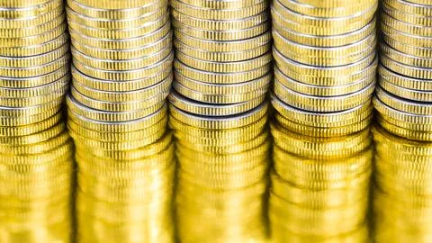 A pile of silver coins Stock Photos