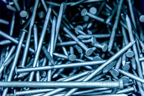 Pile of silver construction nails Foto stock
