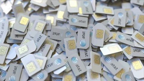 Pile of SIM cards with AT&amp;T Inc. logo, close-up. Editorial telecommunication Stock Footage 111157896