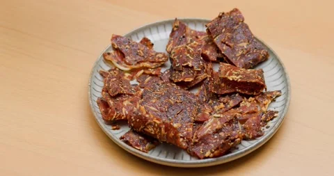 Pile of sliced crispy pork jerky Stock Footage 234801020
