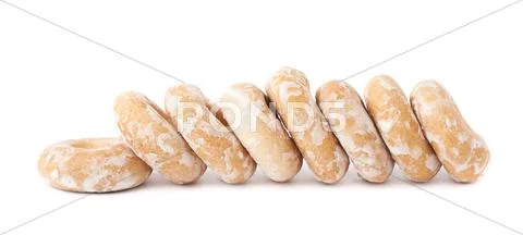 Pile of small cakes with hole isolated over the white background Stock Photos