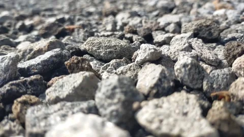 A pile of small rocks and some falling off Stock Footage 270700211
